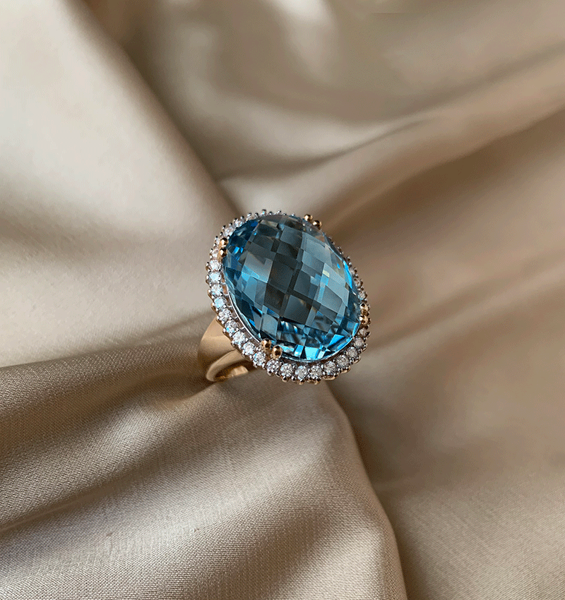 Yellow gold ring with zircon and topaz