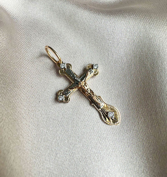 Крестик из розового золота с цирконом