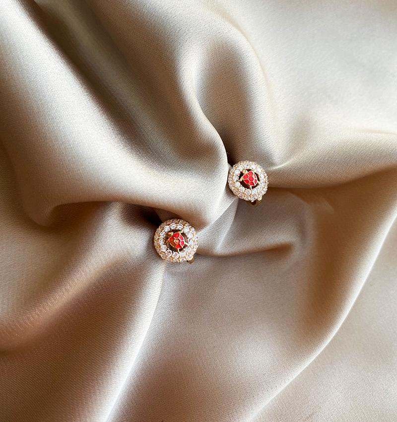 Rose gold earrings with zircon and enamel