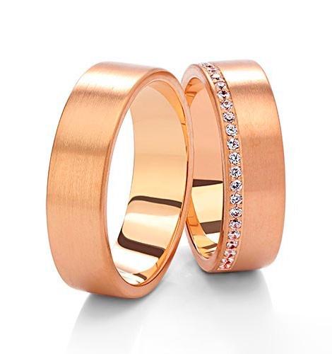 Wedding rings in white, rose, and yellow gold with cubic zirconia