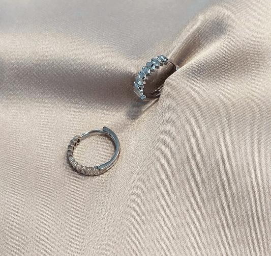 White gold earrings with zircon