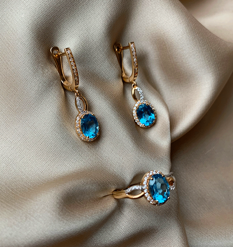 Rose gold set with zircon and topaz