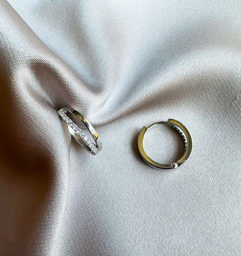 Серьги из белого золота с бриллиантом 0.12ct