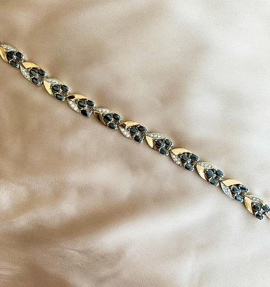 Браслет из серебра с золотыми вставками с цирконом