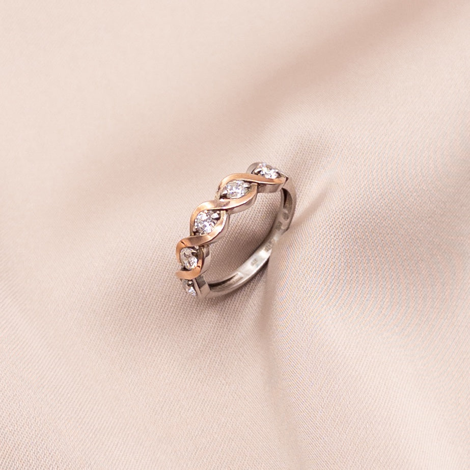 Sterling silver ring with gold inserts and cubic zirconia