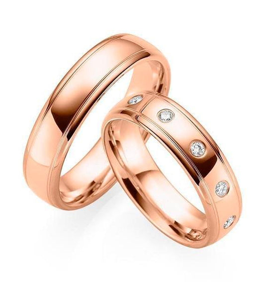 Wedding rings in white, rose, and yellow gold with cubic zirconia