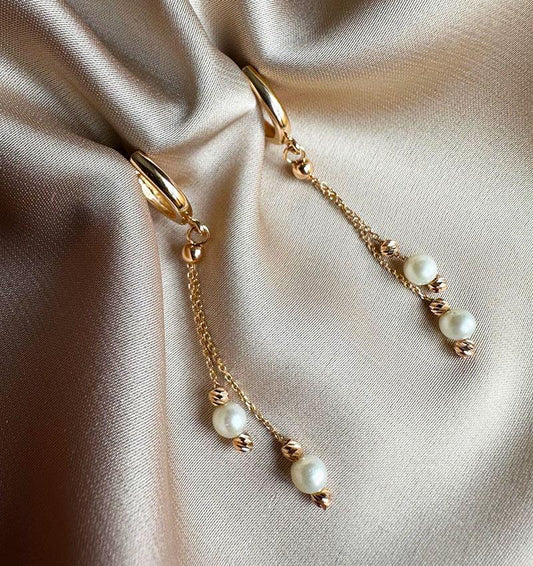Rose gold earrings with pearls