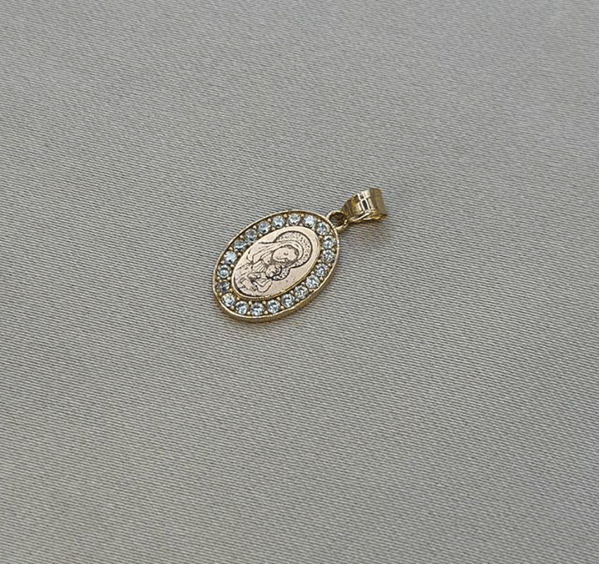 Rose gold icon with zircon