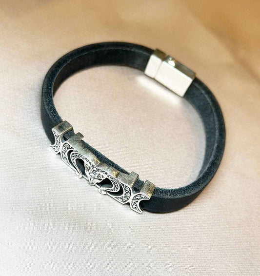 Silver bracelet with rubber and leather