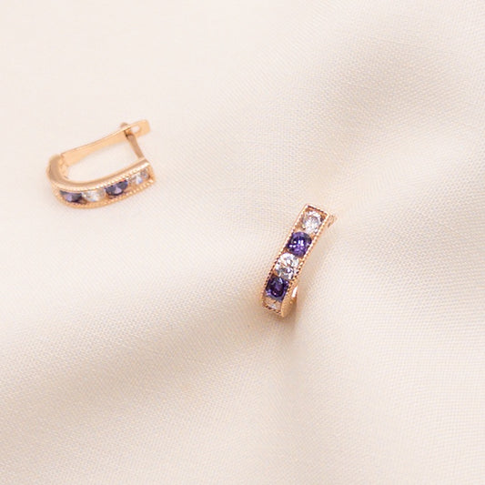 Rose gold earrings with zircon