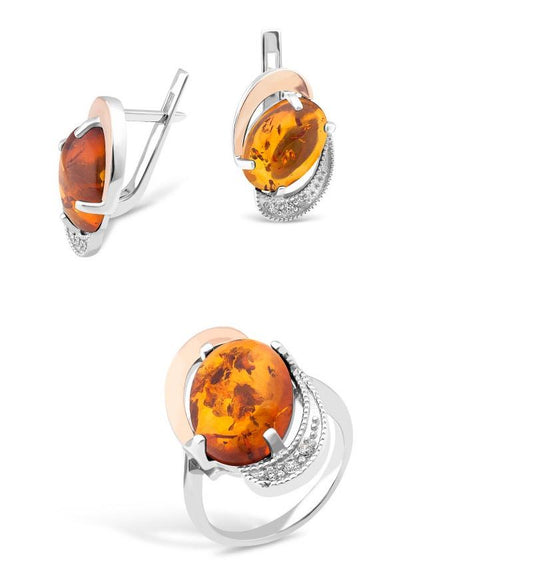 Un set de argint cu inserții de aur, zirconiu și chihlimbar