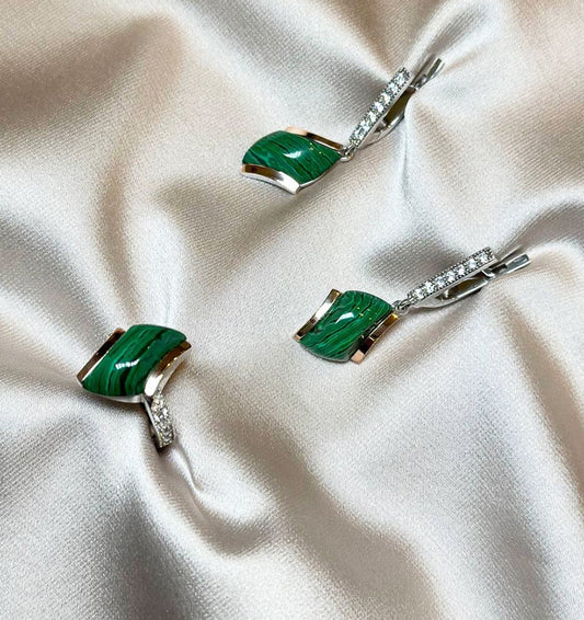 A set of silver with gold inserts, malachite and zircon