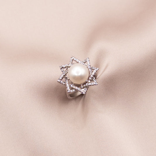 Silver ring with zircon and pearls