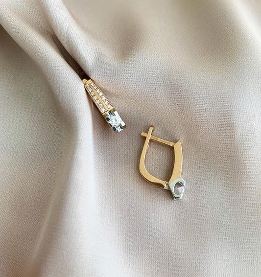 Rose gold earrings with a 0.29ct diamond