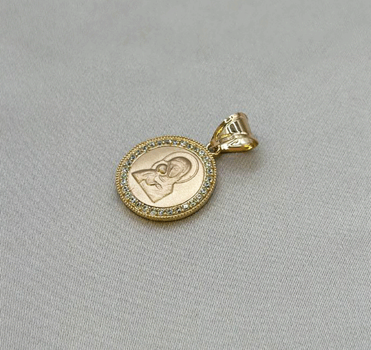 Rose gold icon with zircon