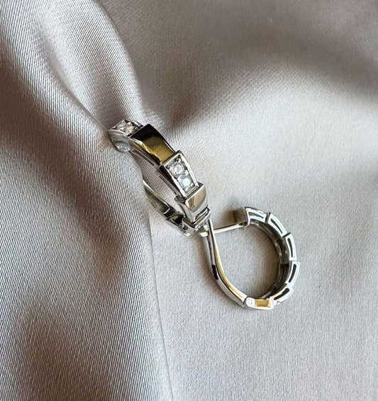 White gold earrings with zircon