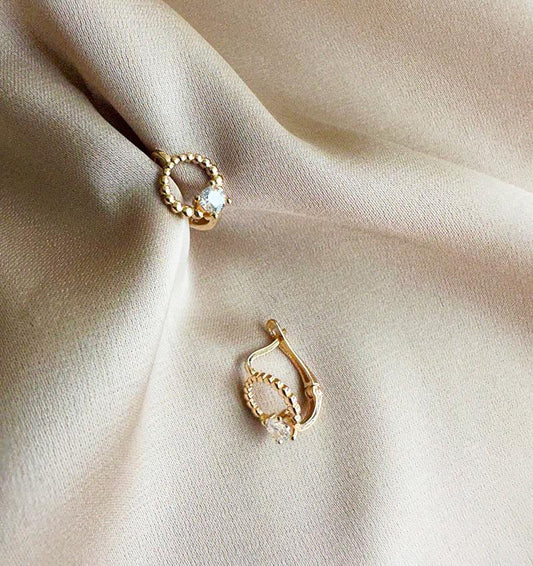 Rose gold earrings with zircon