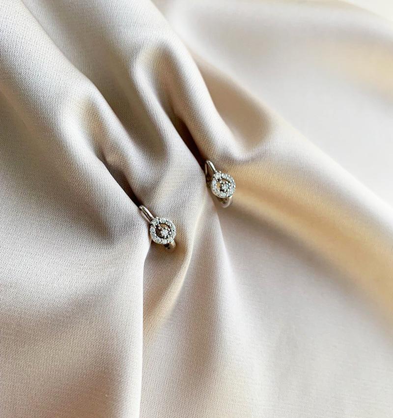 White gold earrings with zircon