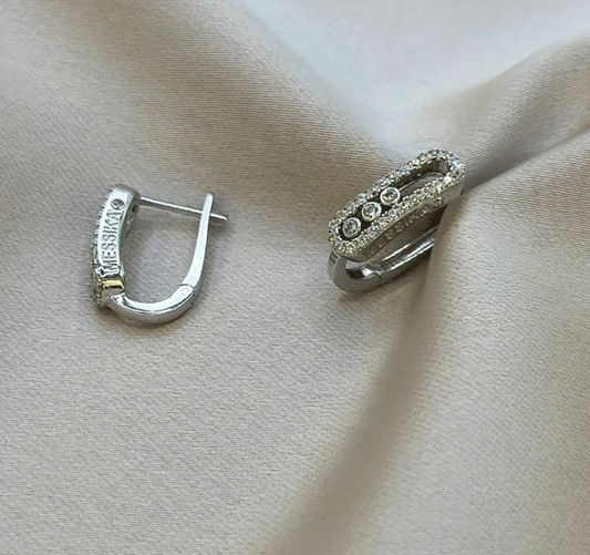 White gold earrings with zircon