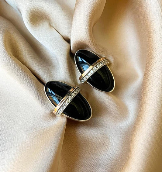 Silver earrings with gold inserts and zircon