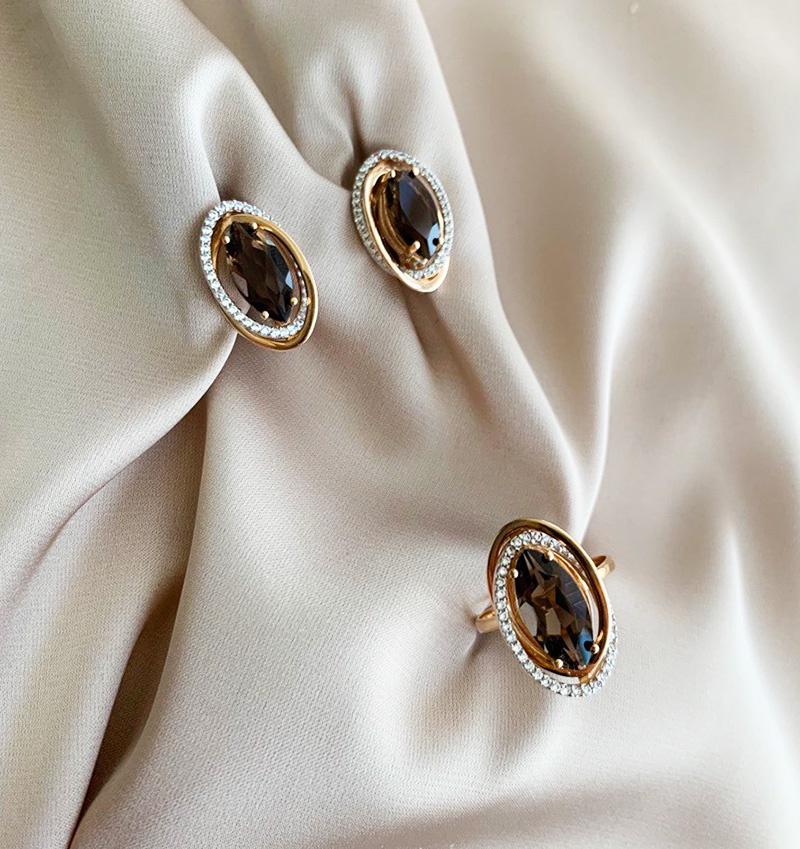 Rose gold set with zircon and smoky topaz