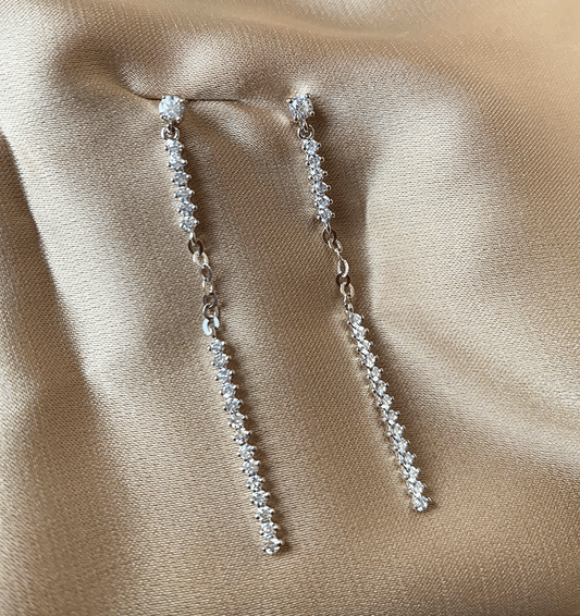 White gold earrings with zircon