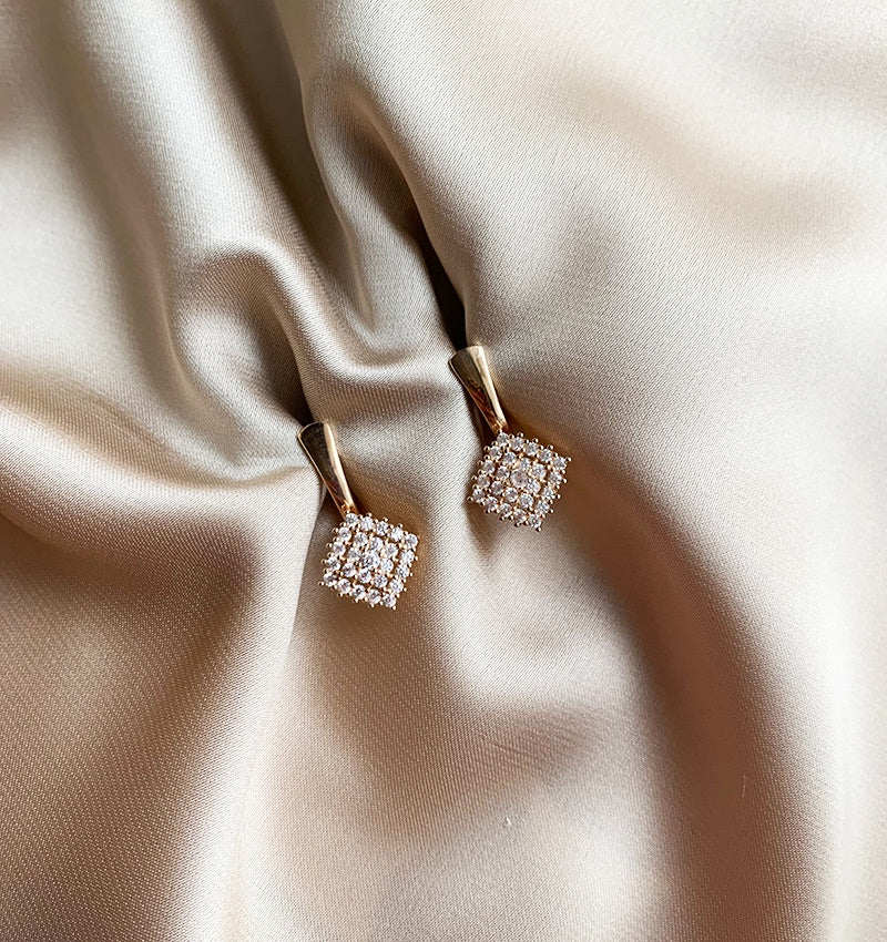 Rose gold earrings with zircon