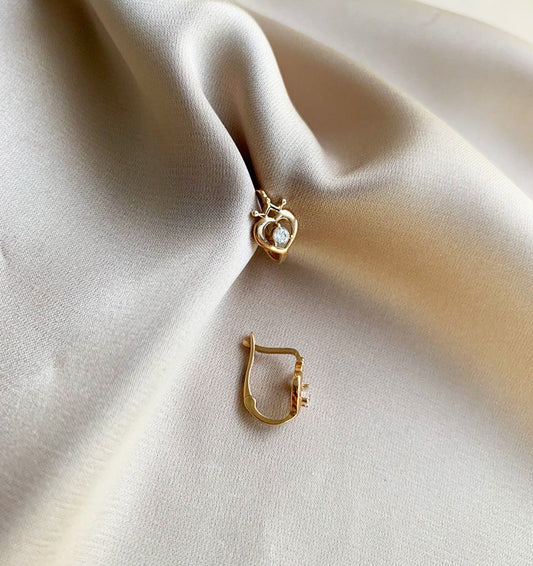 Rose gold earrings with zircon