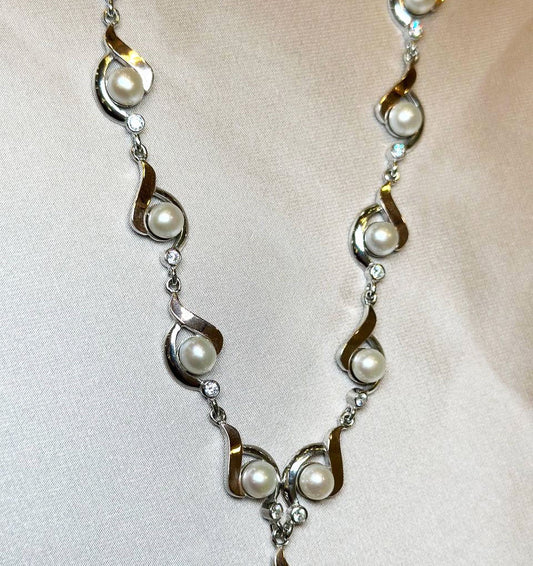 Silver necklace with gold inserts, zircon and pearls