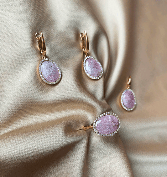 Rose gold set with zircon and quartz