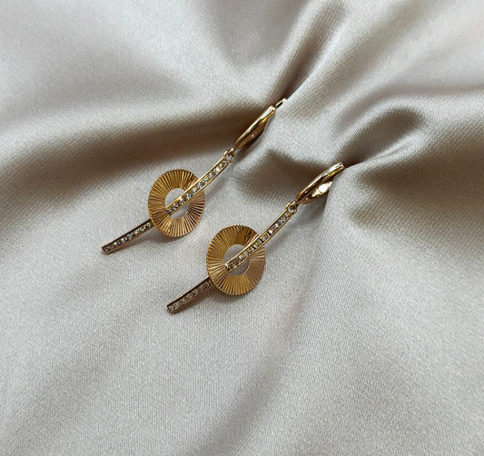 Rose gold earrings with zircon