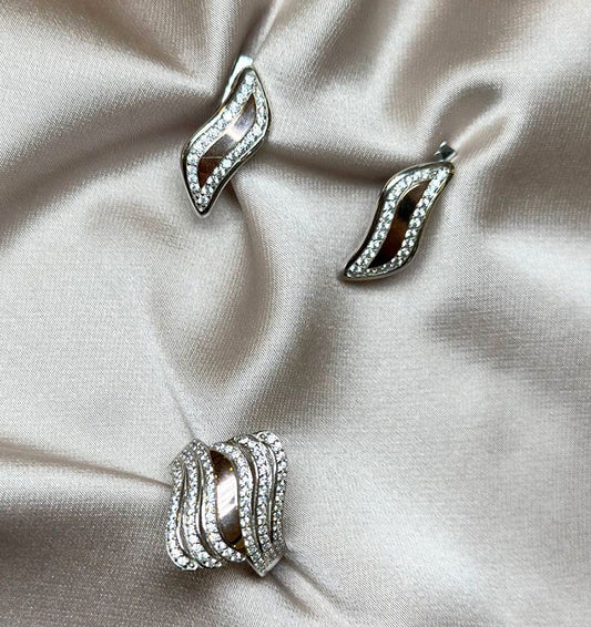 Set of silver with gold inserts and zircon