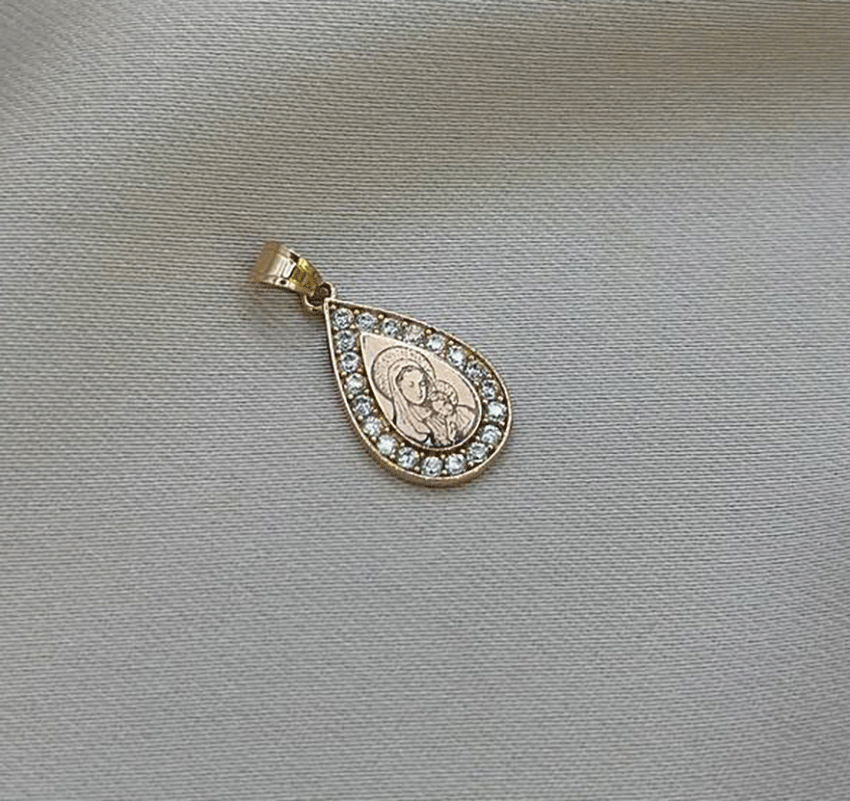 Rose gold icon with zircon