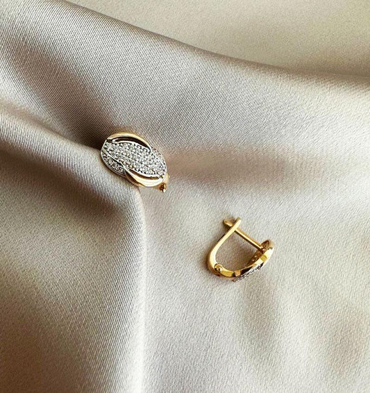 Rose gold earrings with zircon