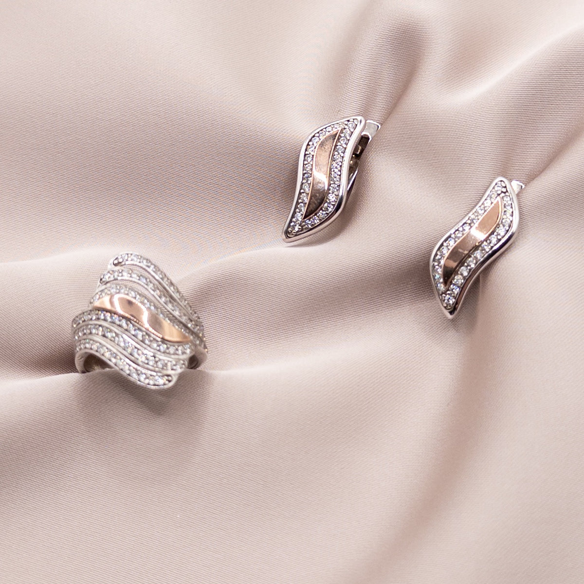 Silver and gold set with cubic zirconia