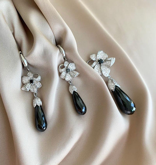 Silver set with cubic zirconia and onyx