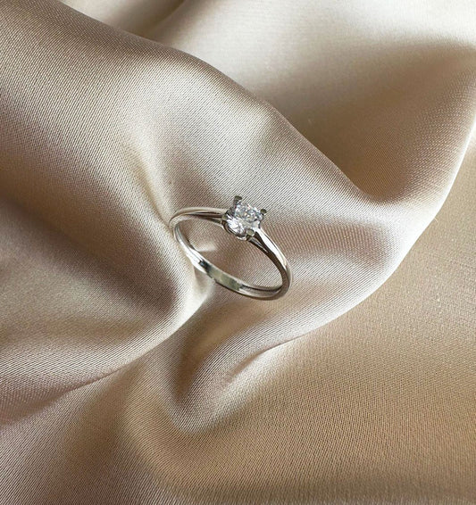 White gold ring with zircon